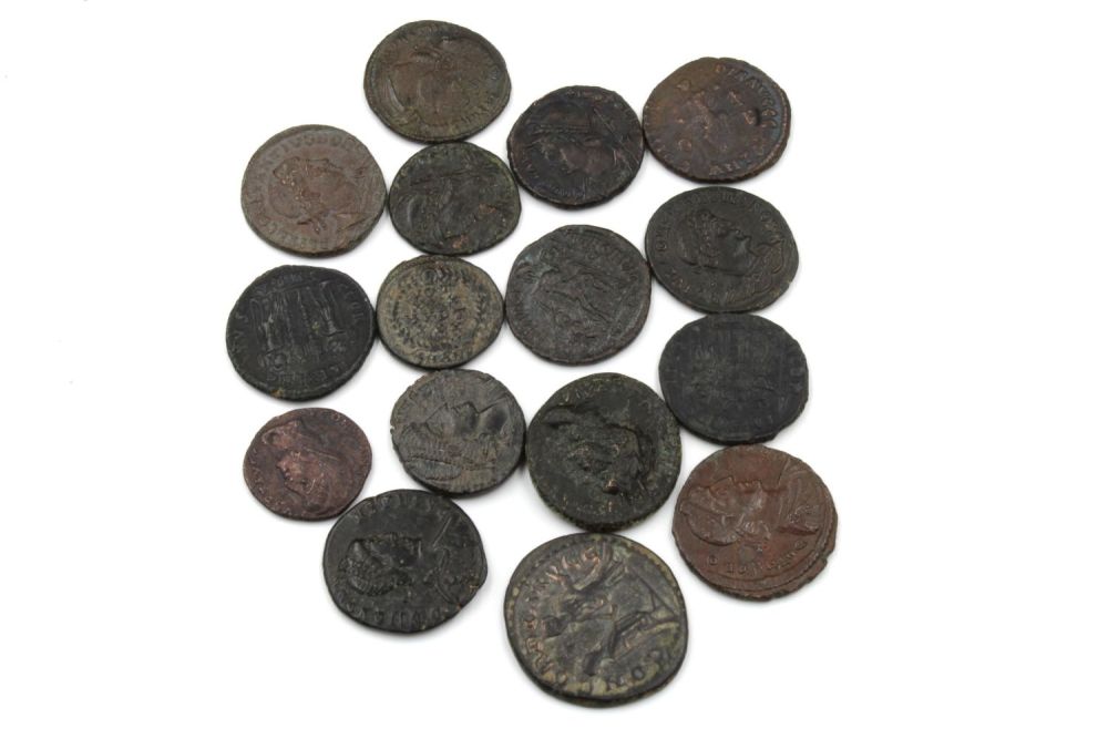 Lot 399: A Lot of 16 Ancient Roman Bronze Coins.