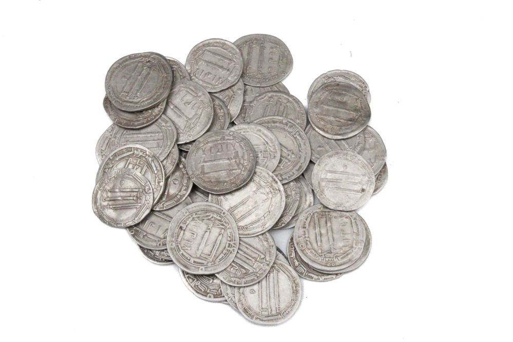 Lot 403: A Lot of 50 Abbasid Islamic Silver Coins...