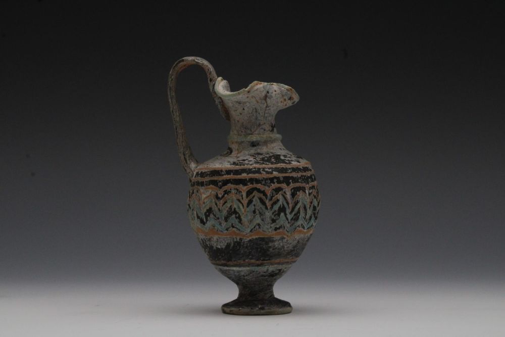 Lot 407: A Glass Amphoriskos (Perfume Bottle) from the Roman...