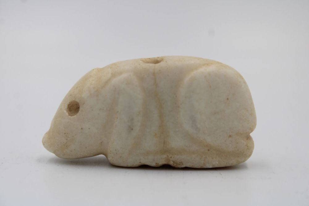 Lot 410: A Jemdet Nasr Crème Alabaster Amulet of a...