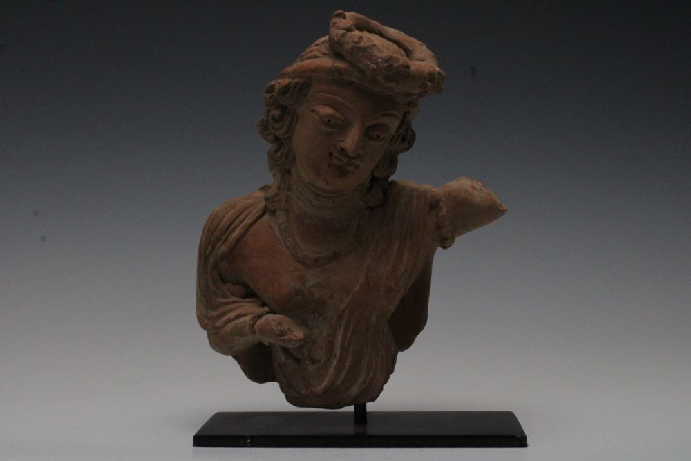 Lot 416: A Rare Terracotta Head with a Body Fragment...