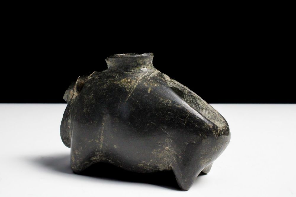 Lot 422: A Black Stone Steatite Vessel in the Form...