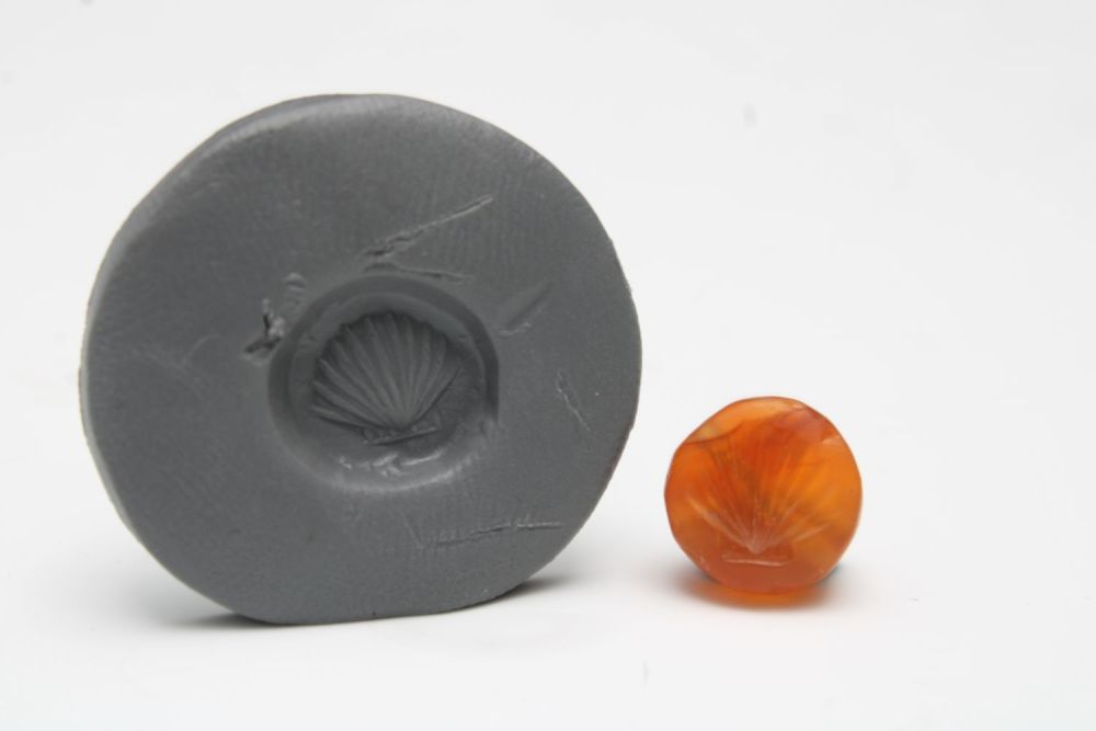 Lot 438: A Greek Agate Scarab Gem Depicting a Sea...