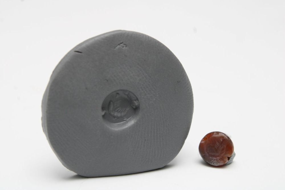 Lot 440: A Fine Dark Red Agate Seal Scarab Gem...