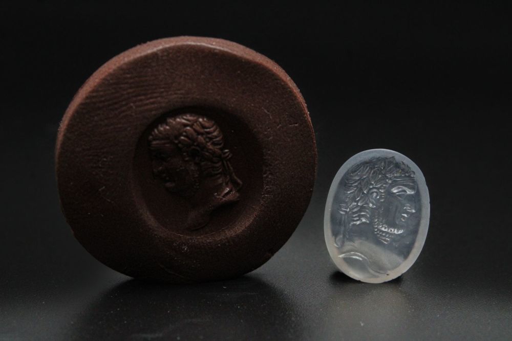Lot 441: A Roman Vespasian Chalcedony Crystal Intaglio from the...