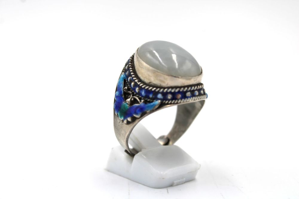 Lot 450: A Chinese Silver Ring with Jade Stone and...