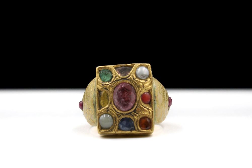 Lot 452: An Indian Navaratna Gold and Enamel Ring with...