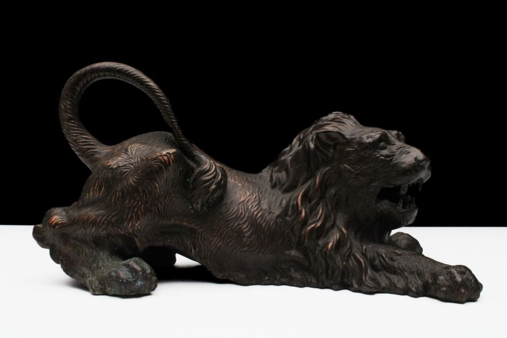 Lot 463: A Bronze Figure of a Lion.
