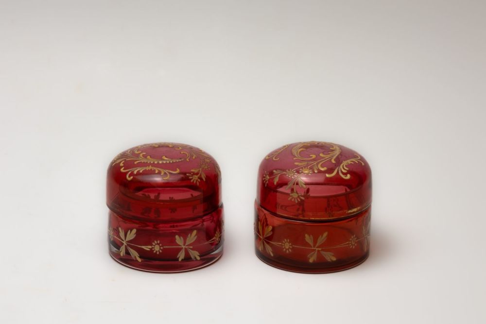 Lot 51: A Pair of Vintage Bohemian Red Glass Powder...