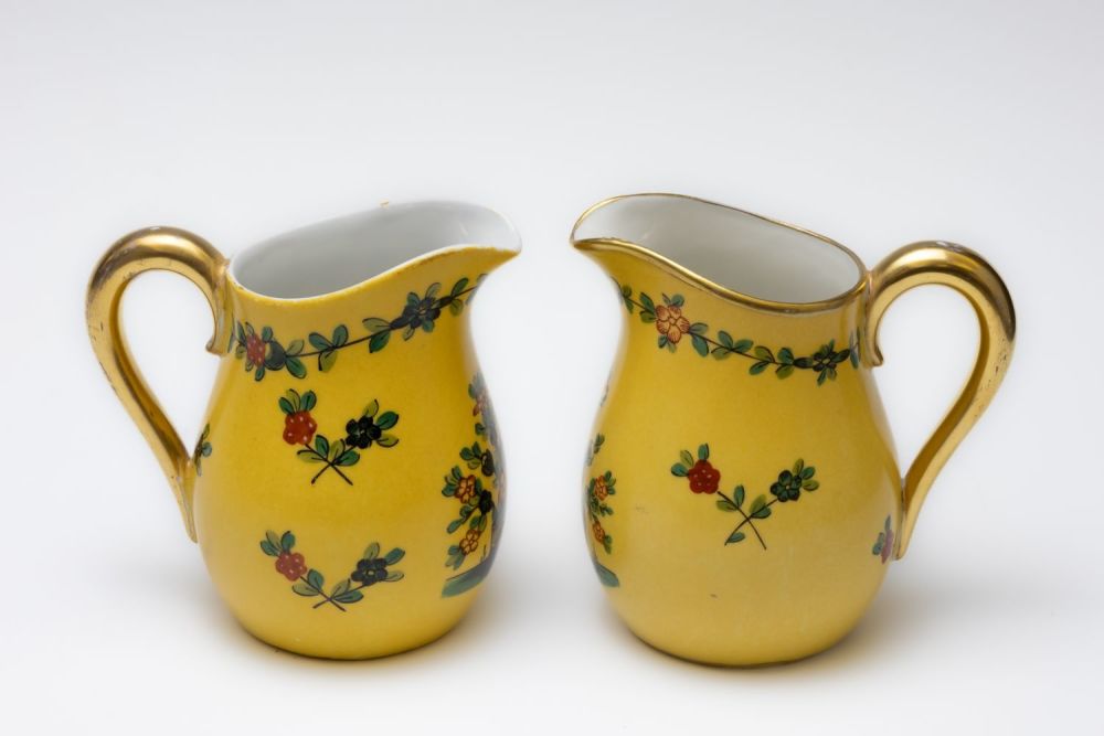 Lot 85: A Pair of Vintage Dresden Yellow Porcelain Milk...