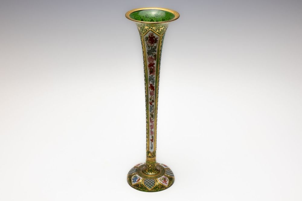Lot 88: A Bohemian Green Overlay Glass Vase from the...
