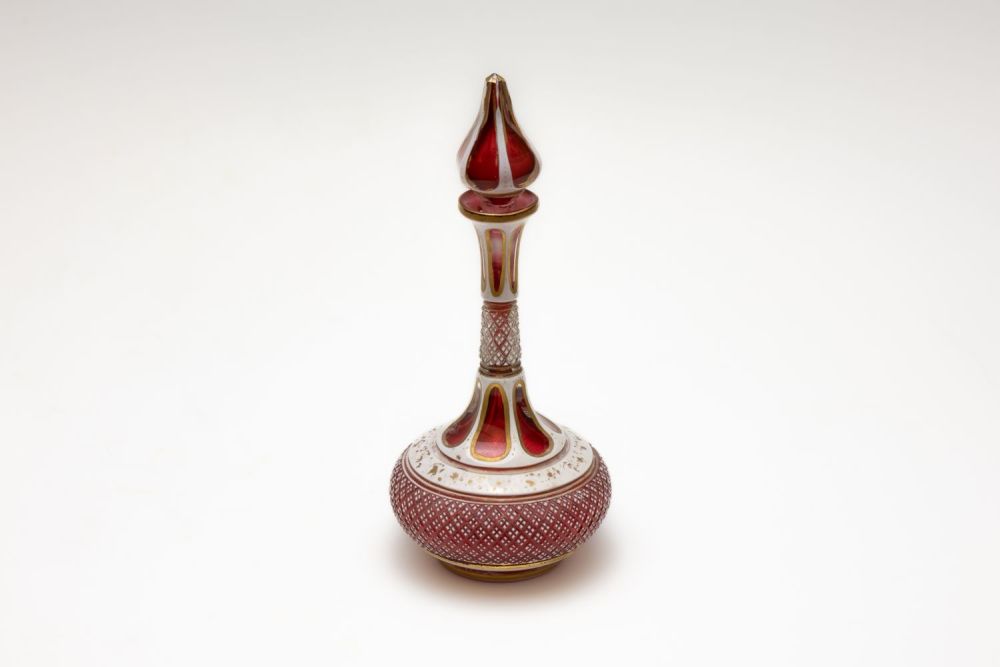 Lot 89: A Bohemian Red Overlay Glass Cologne Bottle from...