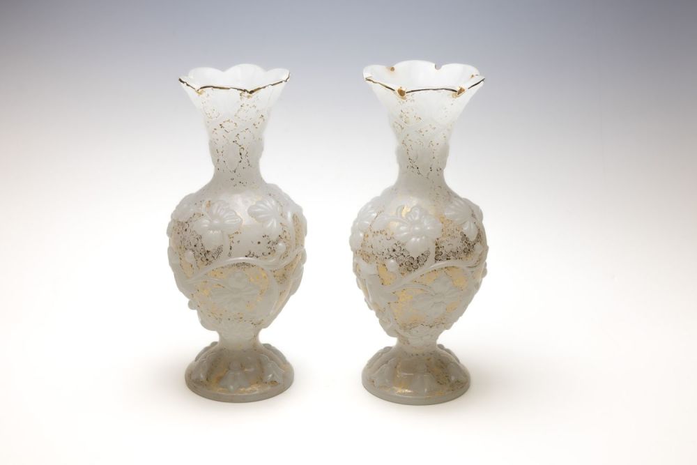 Lot 91: A Pair of Baccarat Opaline Vases from the...