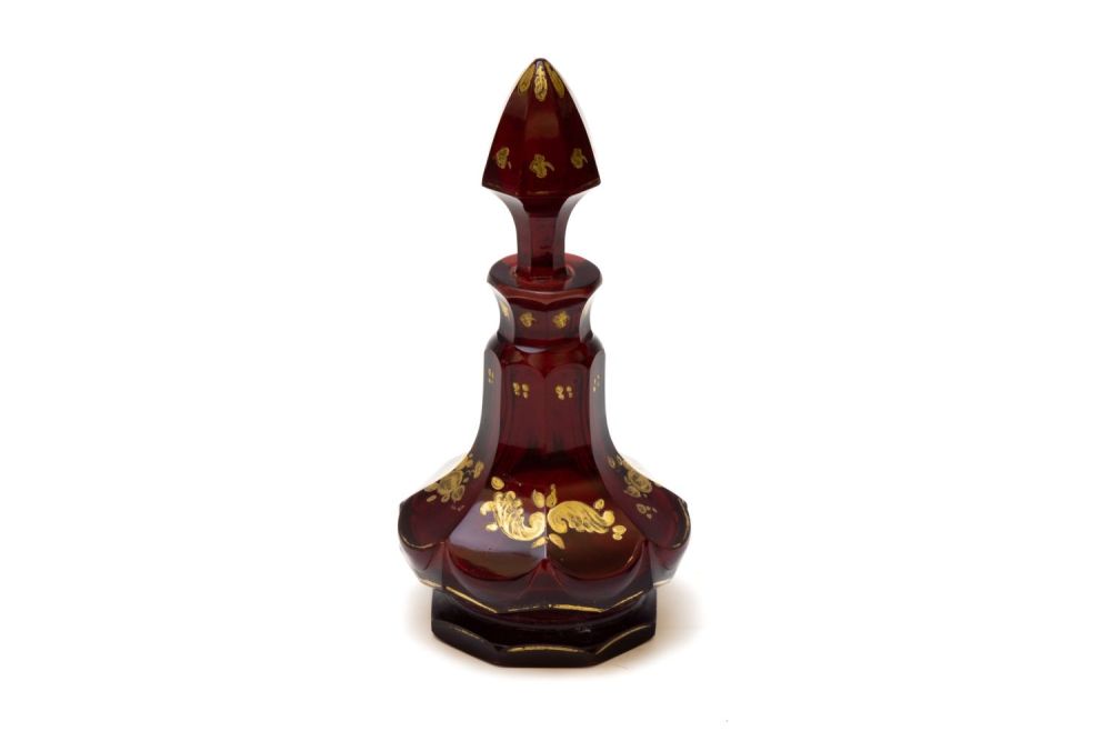 Lot 105: A Vintage Bohemian Dark Red Glass Perfume Bottle...