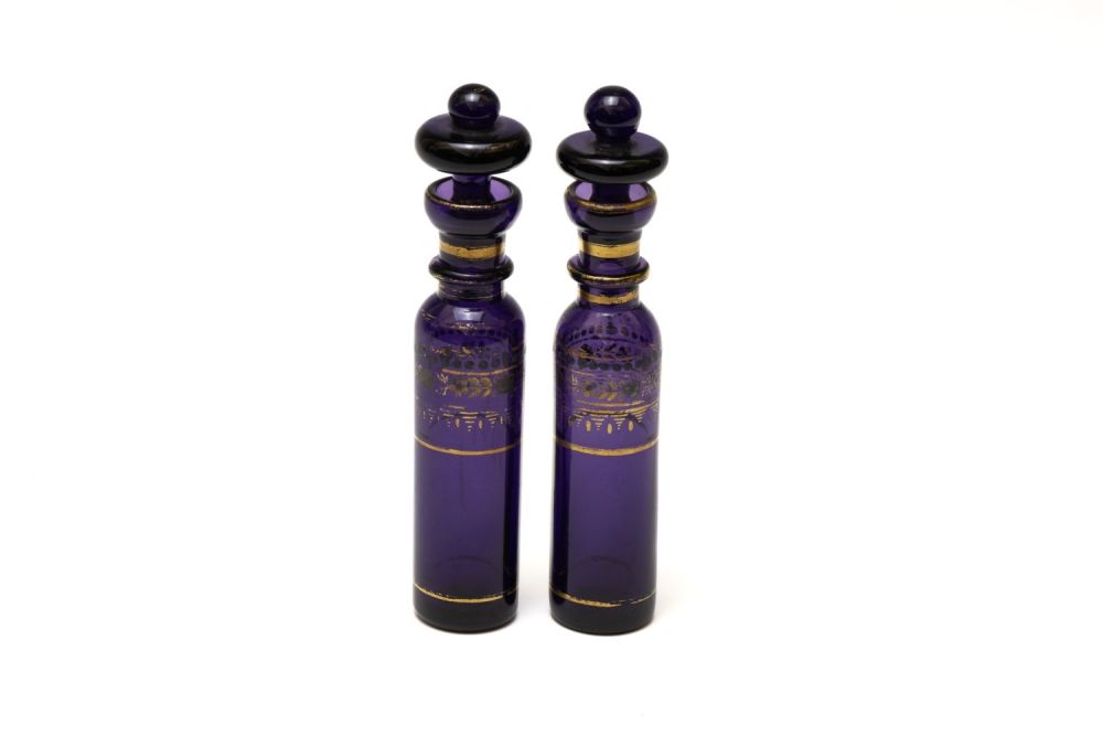 Lot 107: A Pair of French Purple Glass Perfume Bottle...