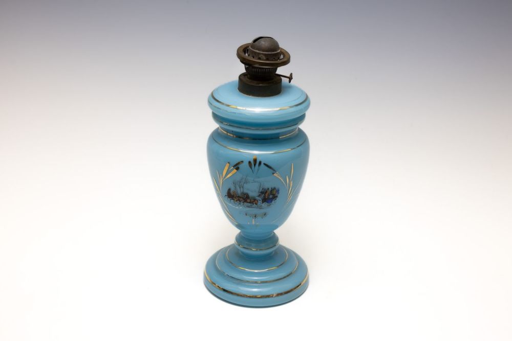 Lot 132: A Victorian Blue Opaline Oil Lamp from the...