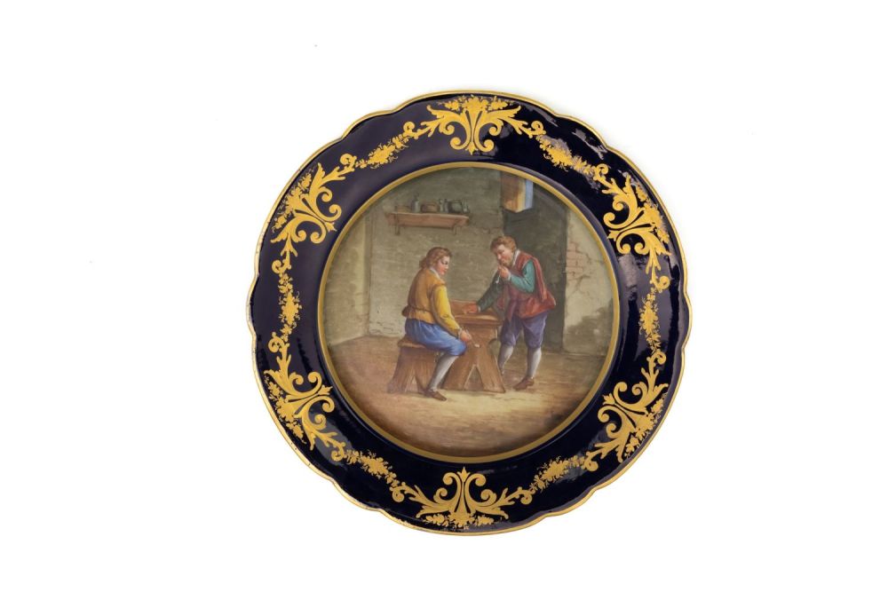 Lot 139: A Vintage French Porcelain Plate with a Character...