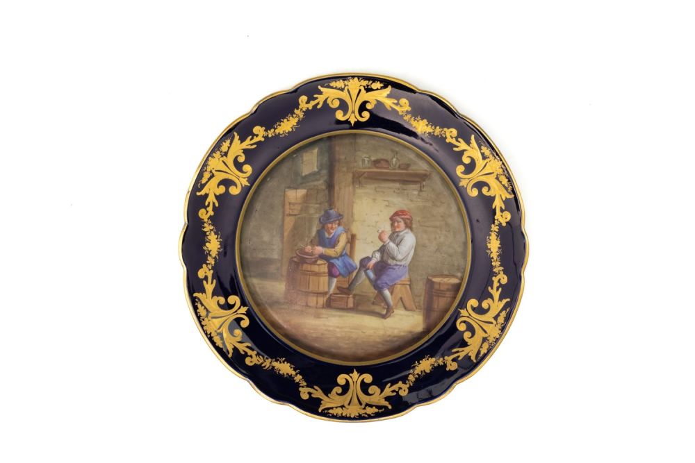 Lot 140: A Vintage French Porcelain Plate with a Character...