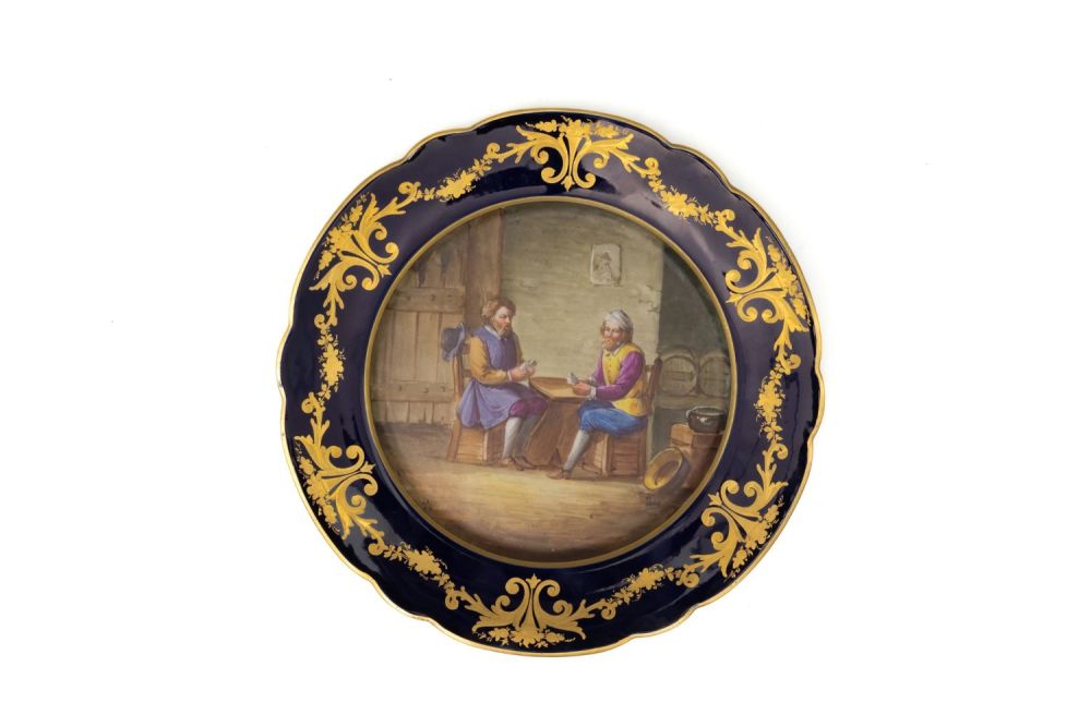 Lot 141: A Vintage French Porcelain Plate with a Character...