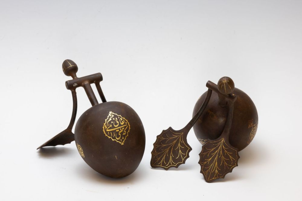 Lot 152: A Pair of Islamic Qajar Figures of Fruits...