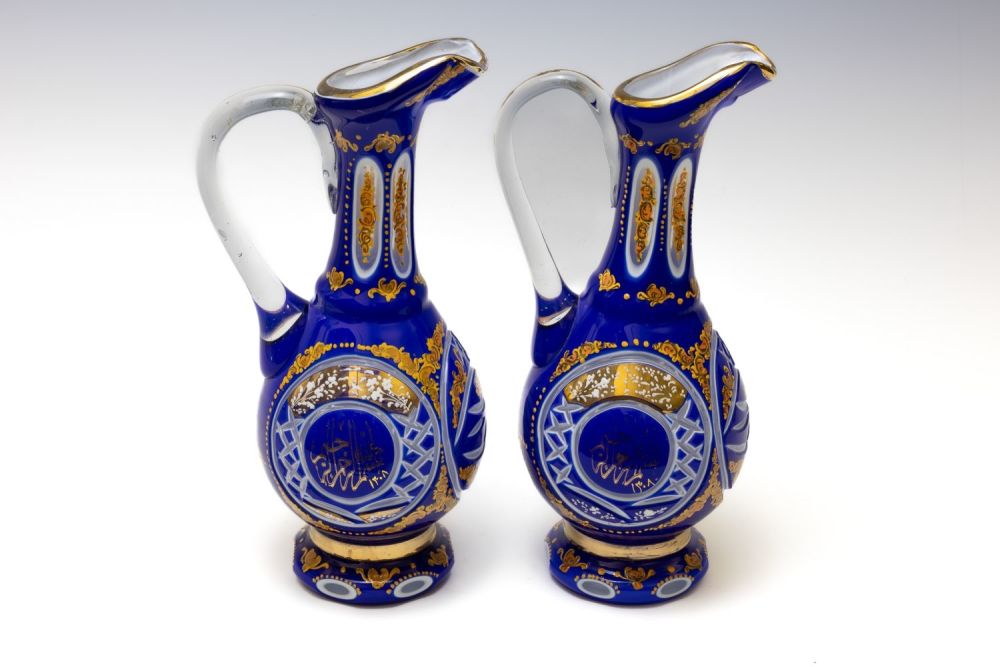 Lot 156: A Pair of Large Bohemian Blue Glass Jugs...