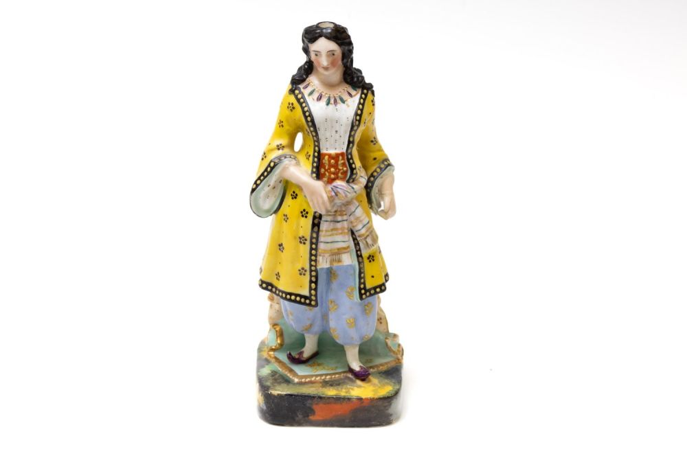 Lot 160: An Islamic Porcelain Figure of a Turkish Woman...