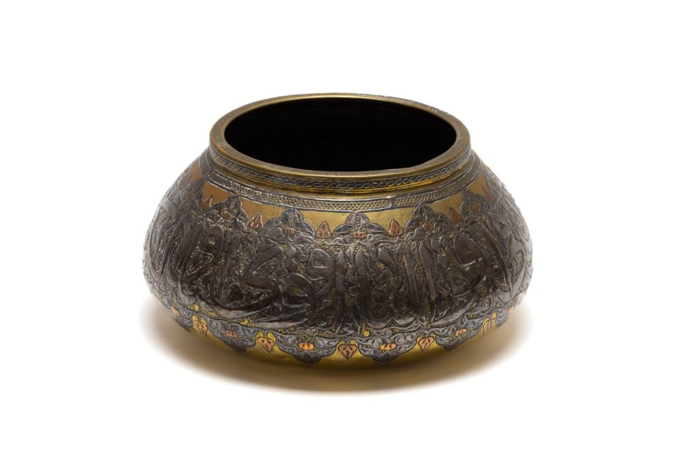 Lot 162: An Islamic Syrian Brass & Silver Inlay Bowl...