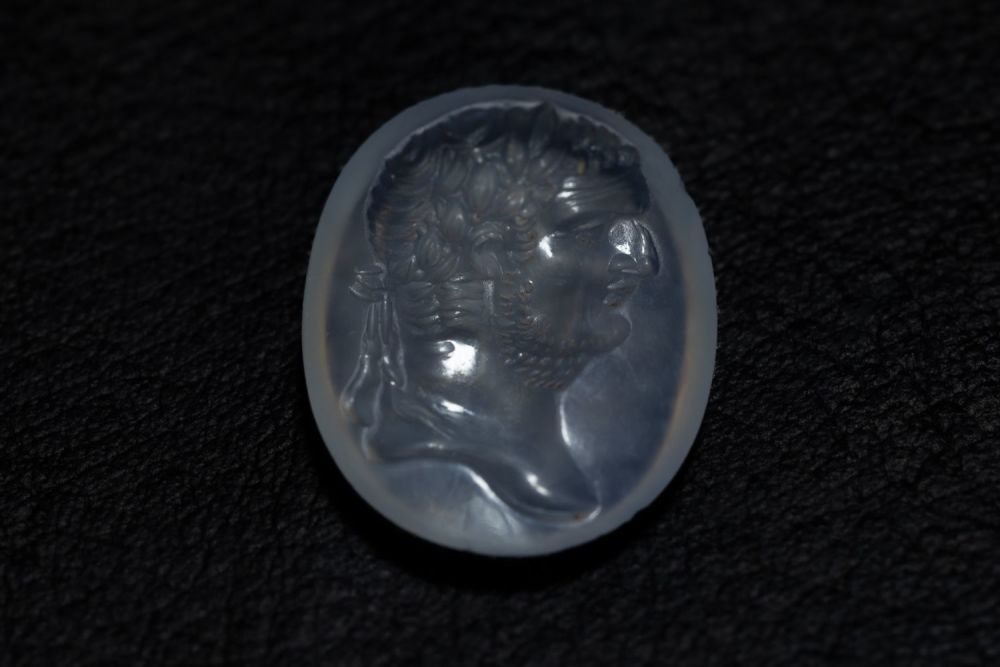 Lot 180: A Roman Vespasian Chalcedony Crystal Intaglio from the...