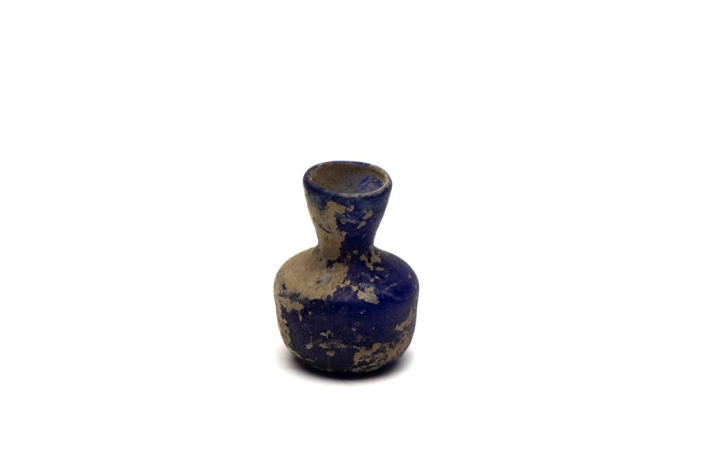 Lot 189: An Islamic Blue Glass with Nice Patina from...