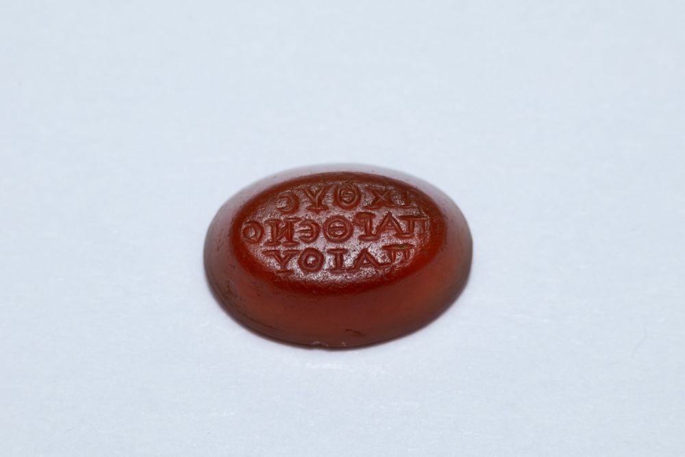 Lot 202: An Ancient Roman Red Agate Oval Stone with...