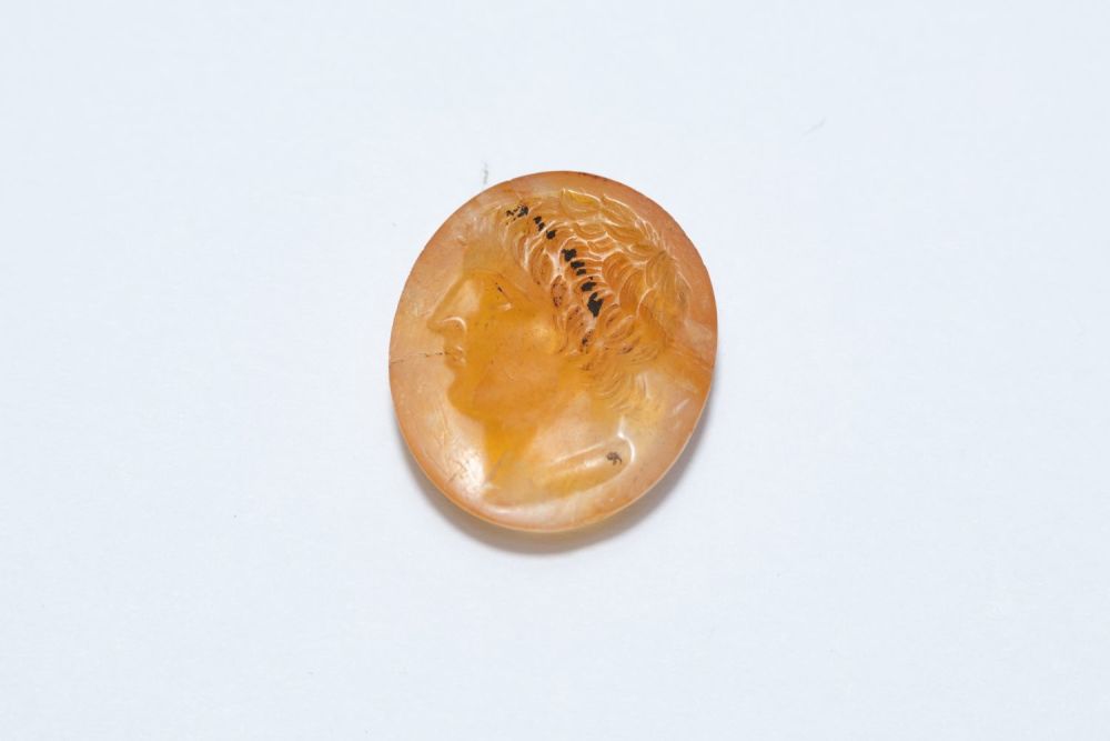 Lot 207: An Ancient Roman Yellow Agate Oval Stone Depicting...