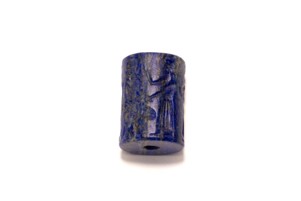 Lot 211: A Lapis Lazuli Cylindrical Stone Seal in the...