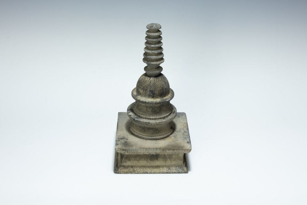 Lot 219: A Gandharan Style Grey Stone Stupa.