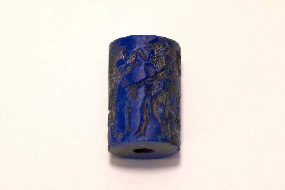 Lot 221: A Lapiz Lazuli Cylindrical Seal in the Style...