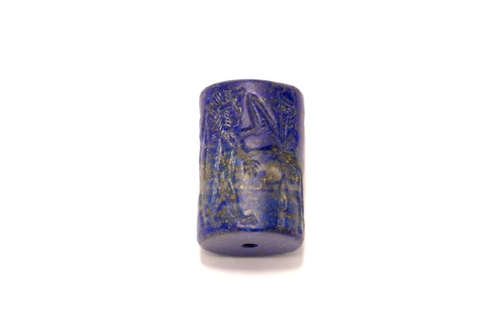 Lot 222: A Lapiz Lazuli Cylindrical Seal in the Style...