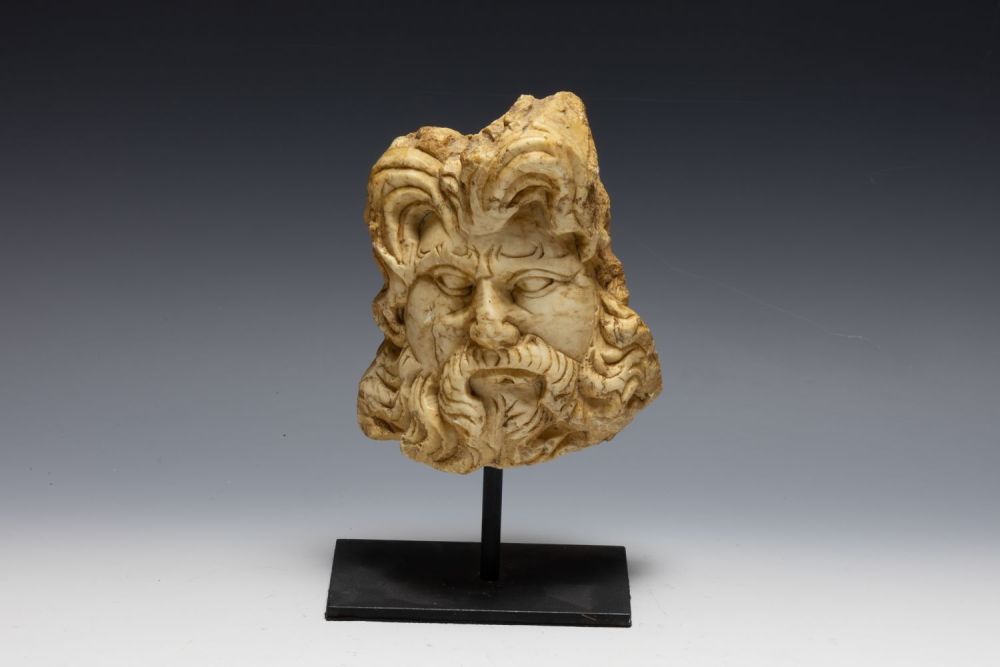 Lot 228: A White Stone Head Statue in the Style...