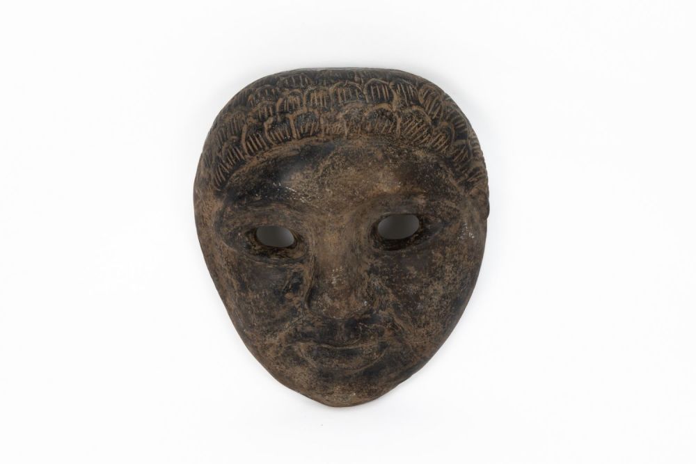Lot 230: A Steatite Stone Mask in the Style of...