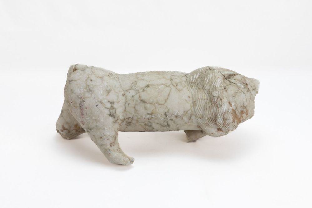 Lot 233: A White Marble Fragmental Roaring Lion from the...