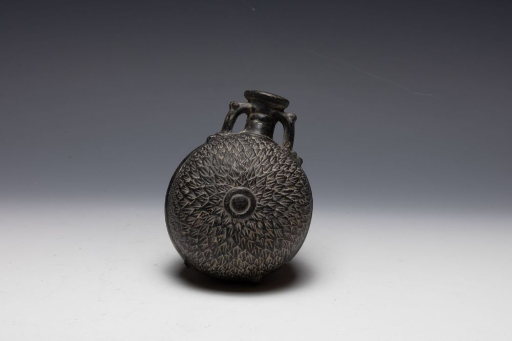 Lot 243: An Ancient Nubian Bottle from the Napatan Period...