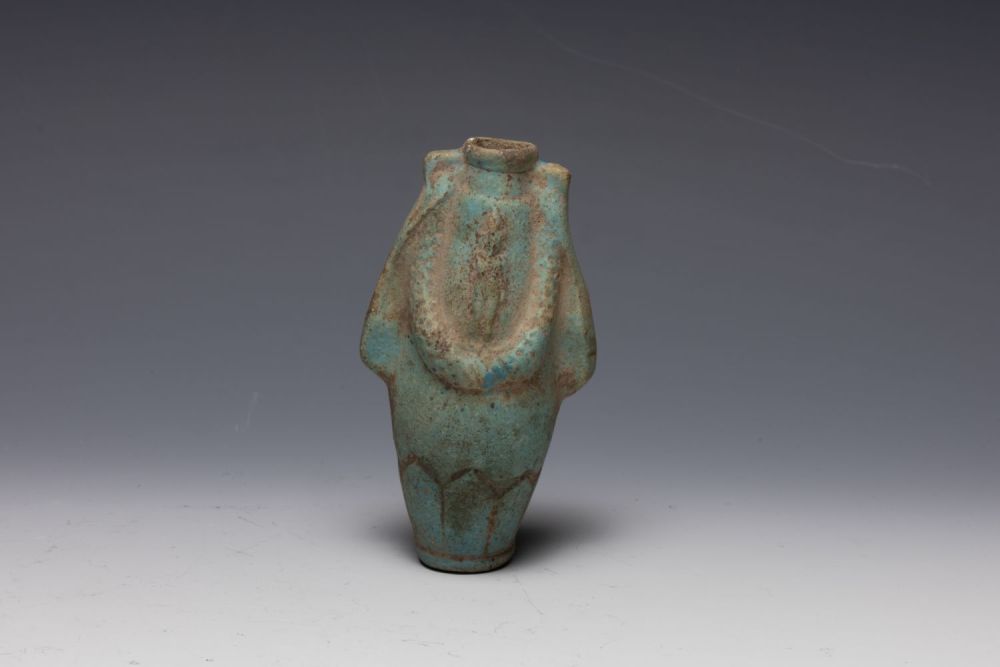 Lot 244: An Egyptian Amulet in the Shape of a...