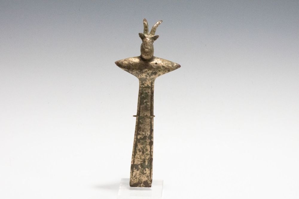 Lot 249: A Large Luristani Bronze Axe Head Depicting a...