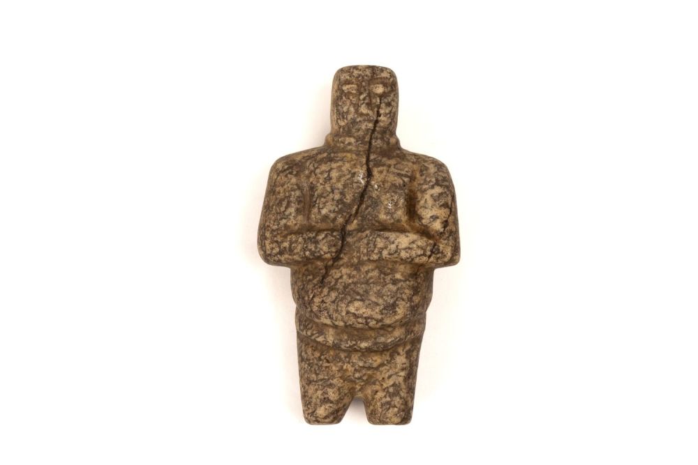 Lot 253: A Granite Figure of a Standing Female Wearing...