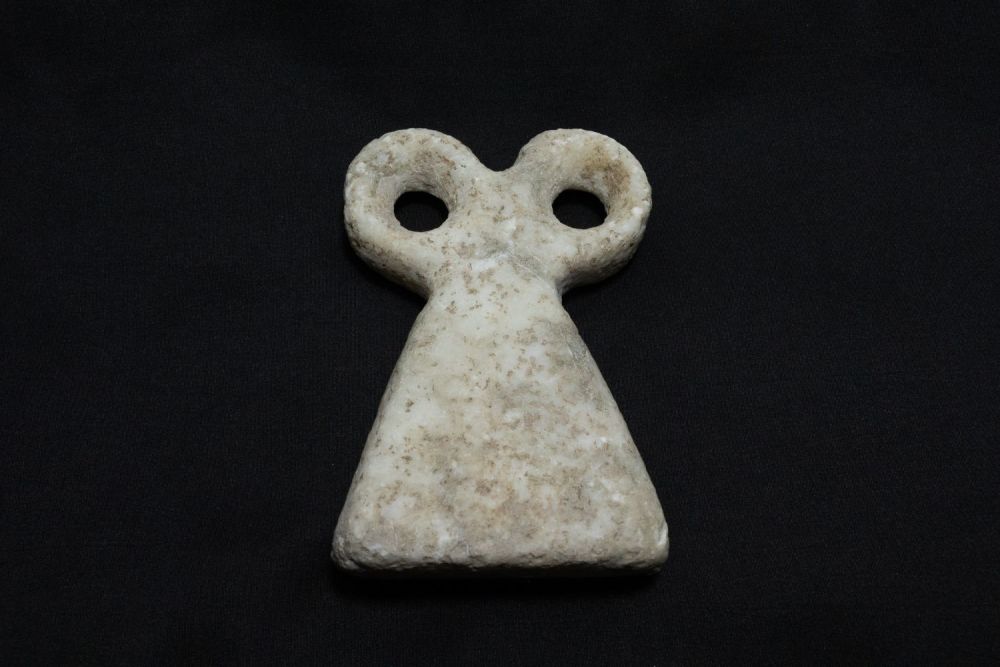 Lot 257: A Mesopotamian Stone Eye Idol.