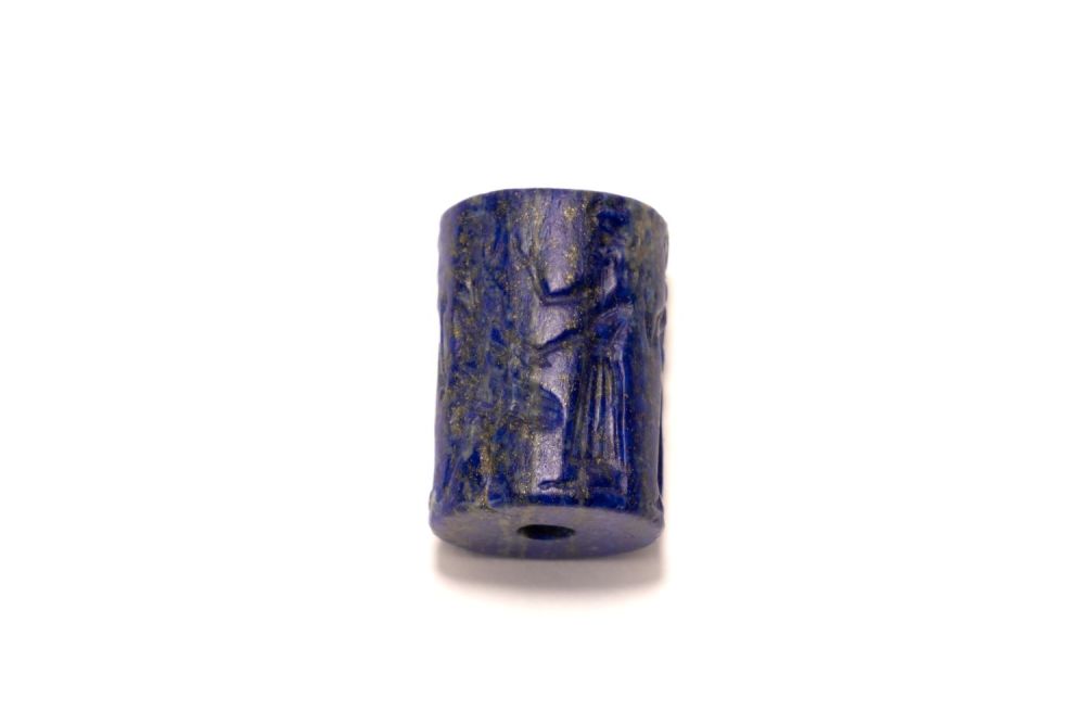 Lot 258: A Lapis Lazuli Cylindrical Seal Possibly Belonging to...