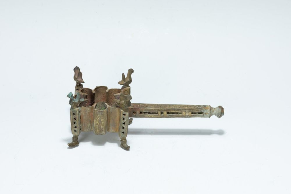 Lot 295: An Islamic Bronze Incense Burner with Islamic Calligraphy...