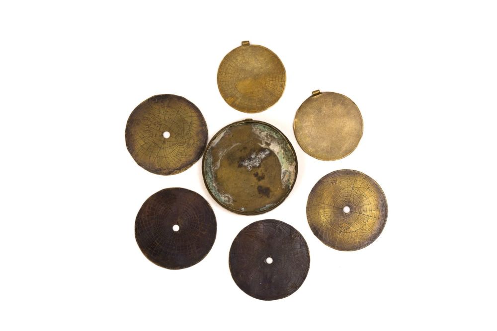 Lot 304: A Lot of 2 Islamic Brass Pendants, 4...