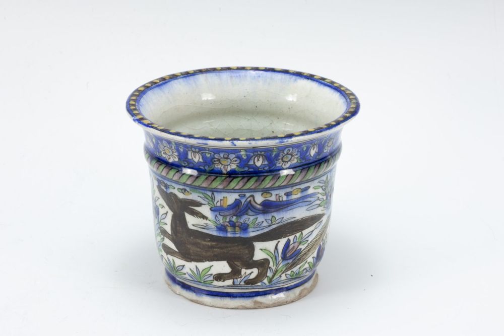 Lot 319: An Islamic Qajar Ceramic Pot from the 19th...
