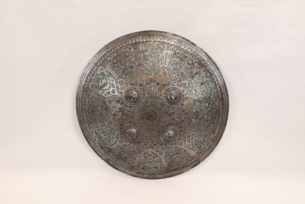 Lot 331: An Islamic Indo-Persian Iron Shield with Openwork and...