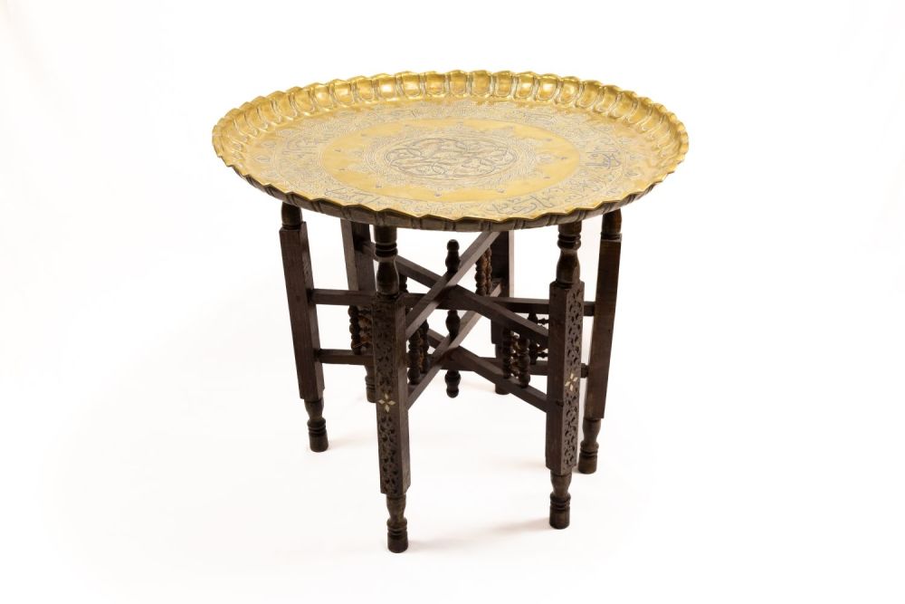 Lot 333: An Islamic Brass Table with Silver and Copper...