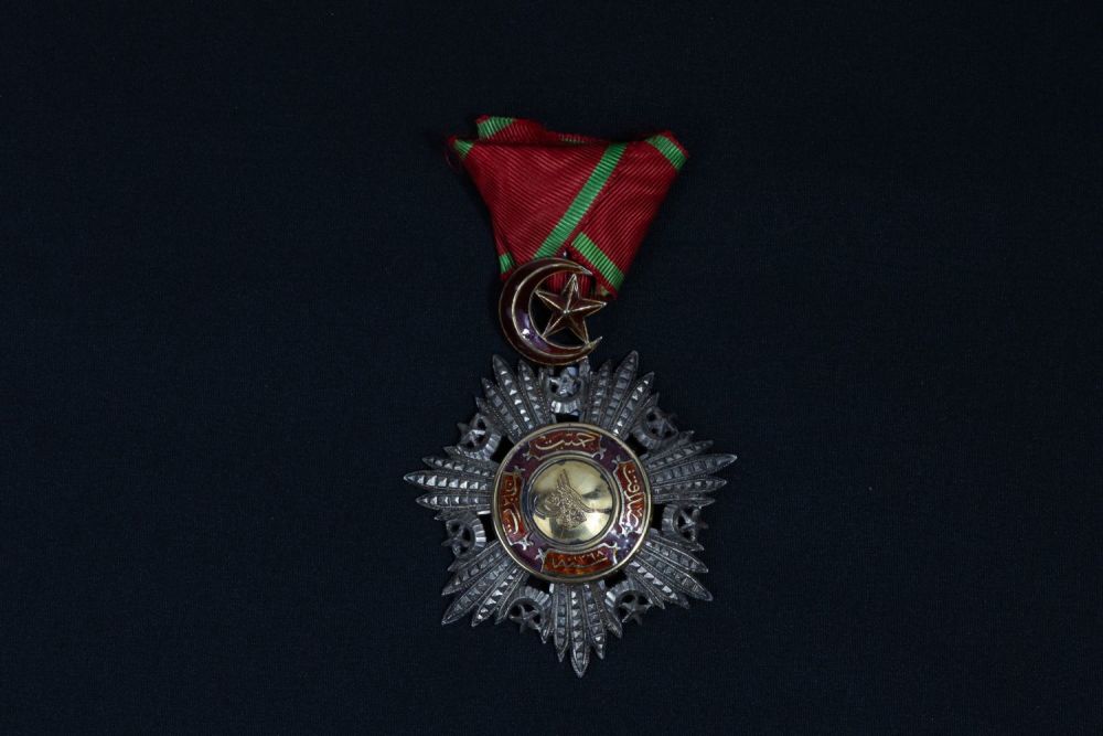Lot 343: An Ottoman Silver & Gold Mejidi Medal from...